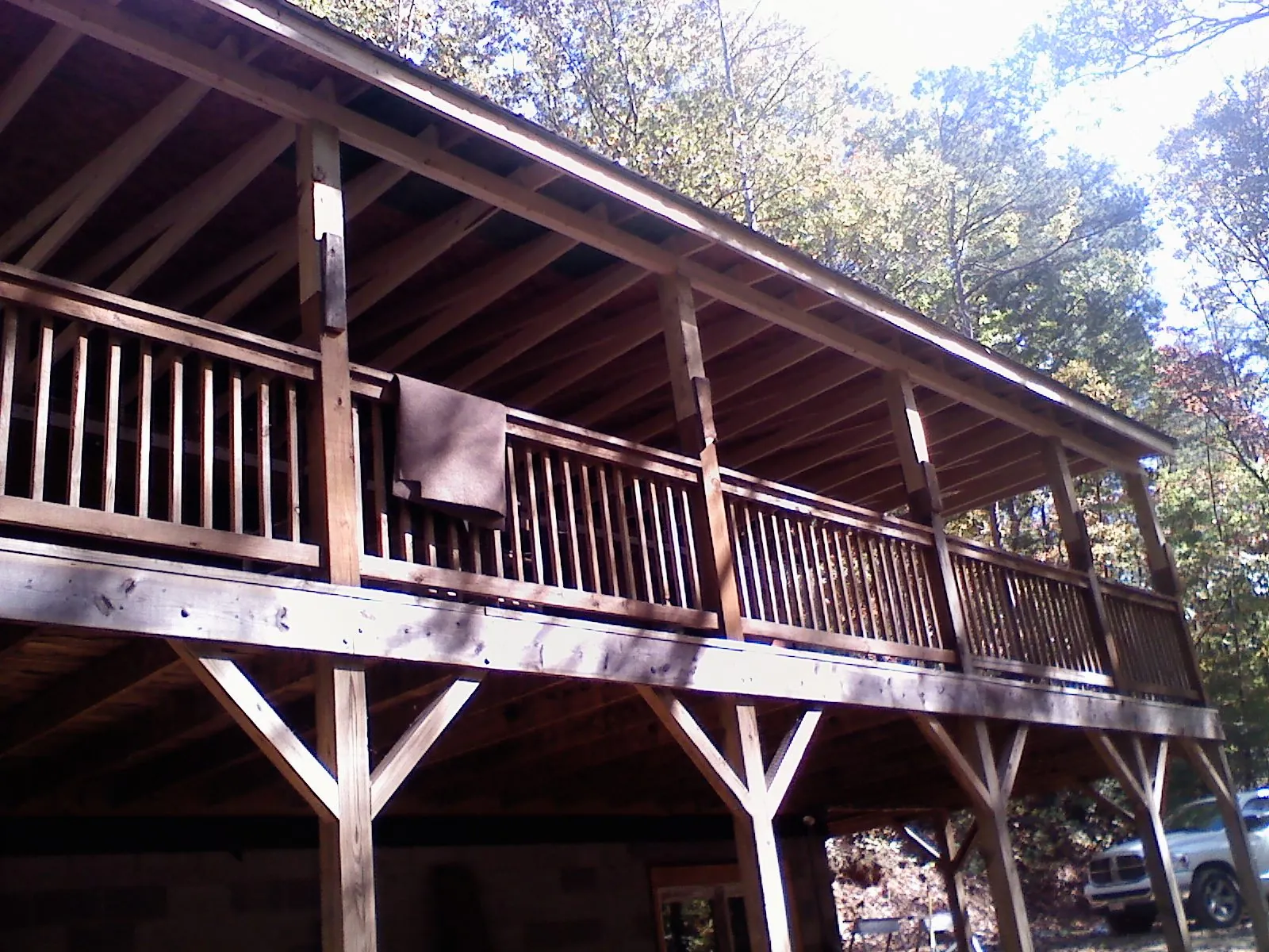 Timber framing under a new elevated porch and deck — Roof Leak Repair in Gould by Roofing Brothers